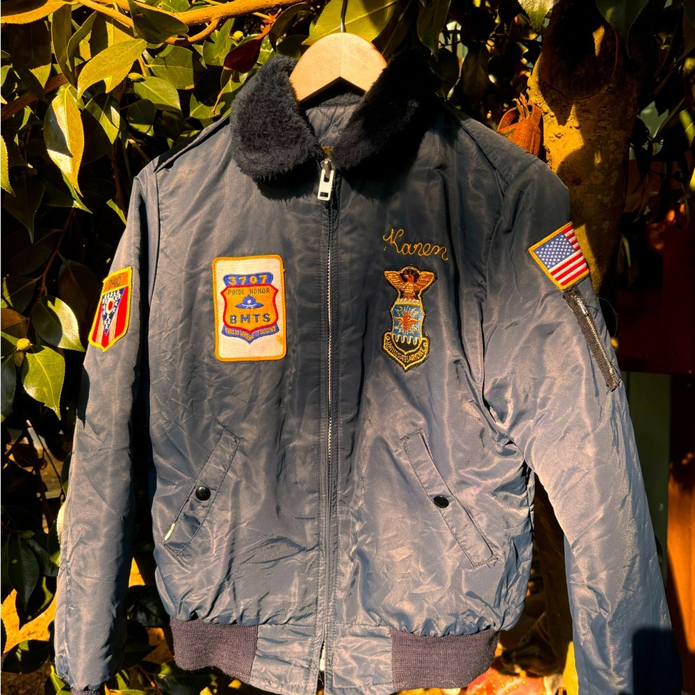 Vintage quilted military jacket with fur collar